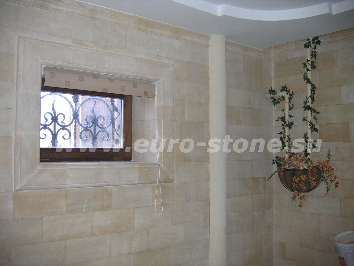 Облицовка фасада коттеджа камнем