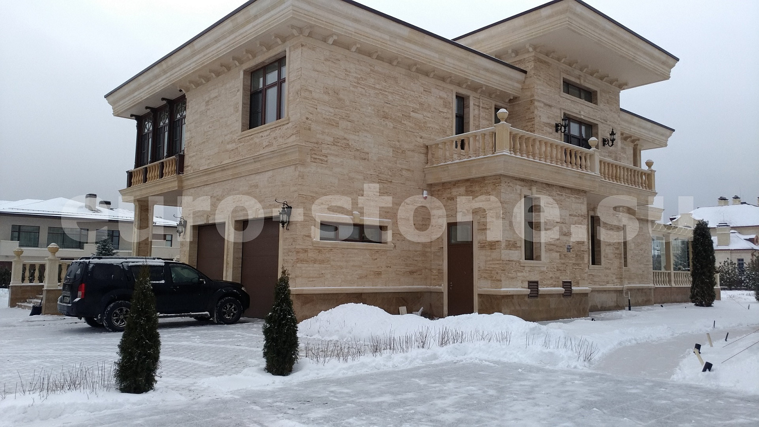 Облицовка фасада травертином